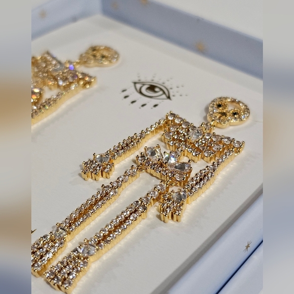 EYECANDY LA Gold Skeleton Dangle Earrings - Picture 4 of 8